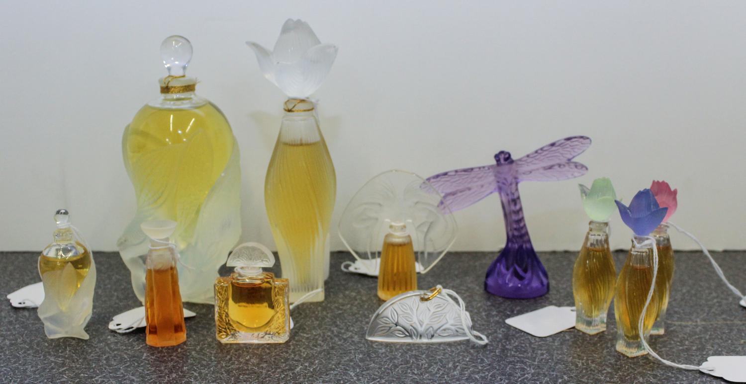 A Collection of Eleven Lalique and Other Perfume Bottles. Height of tallest 5 3/4 inches.