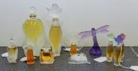 A Collection of Eleven Lalique and Other Perfume Bottles. Height of tallest 5 3/4 inches.