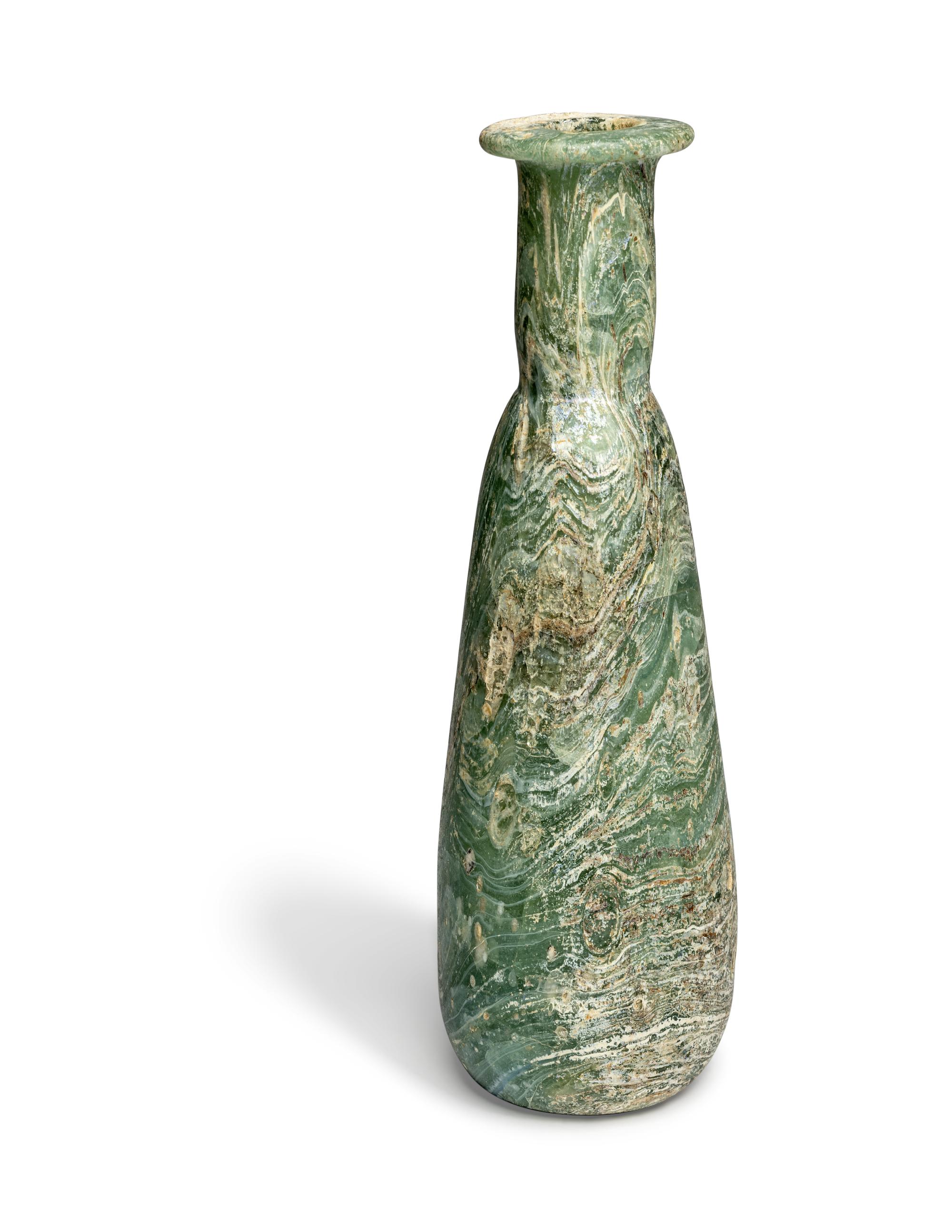 A Large Roman Marbled Glass Bottle