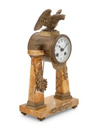 An Empire Style Gilt Bronze Mounted Marble Mantel Clock
