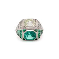 ART DECO, EMERALD AND DIAMOND SCULPTURAL 'TOI ET MOI' RING