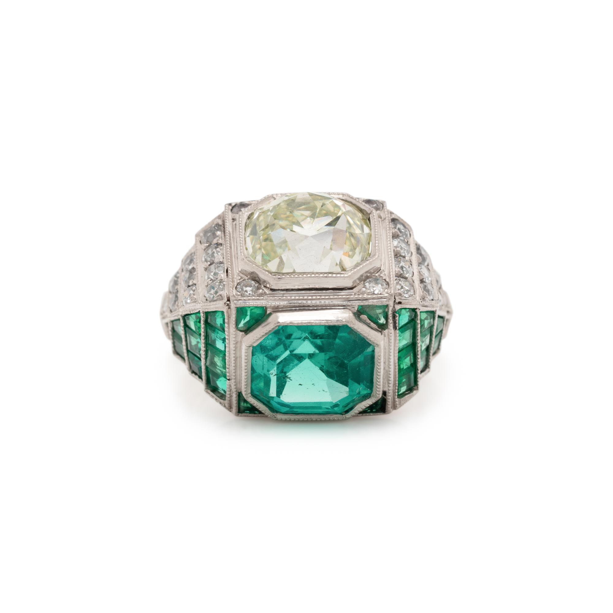 ART DECO, EMERALD AND DIAMOND SCULPTURAL 'TOI ET MOI' RING