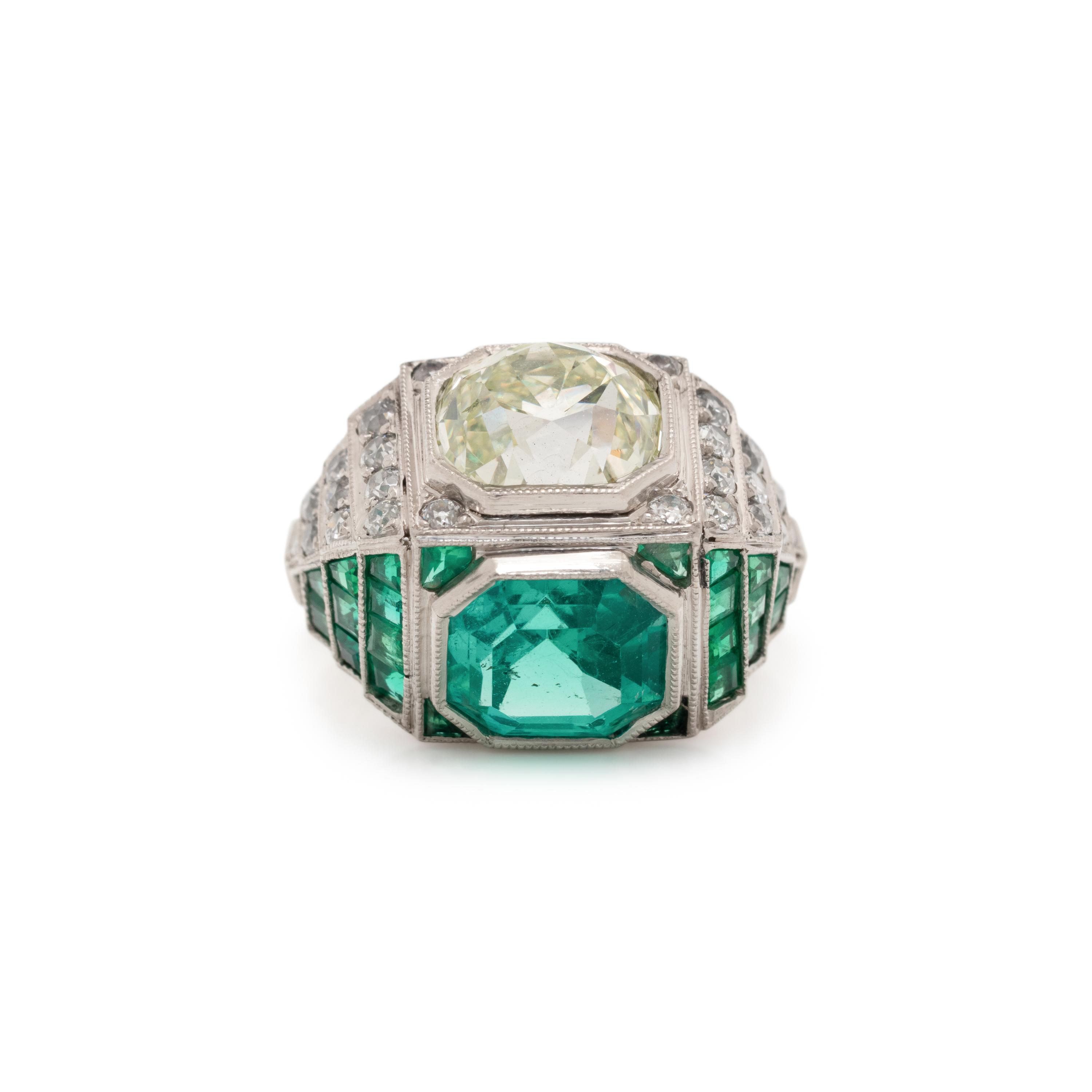 ART DECO, EMERALD AND DIAMOND SCULPTURAL 'TOI ET MOI' RING