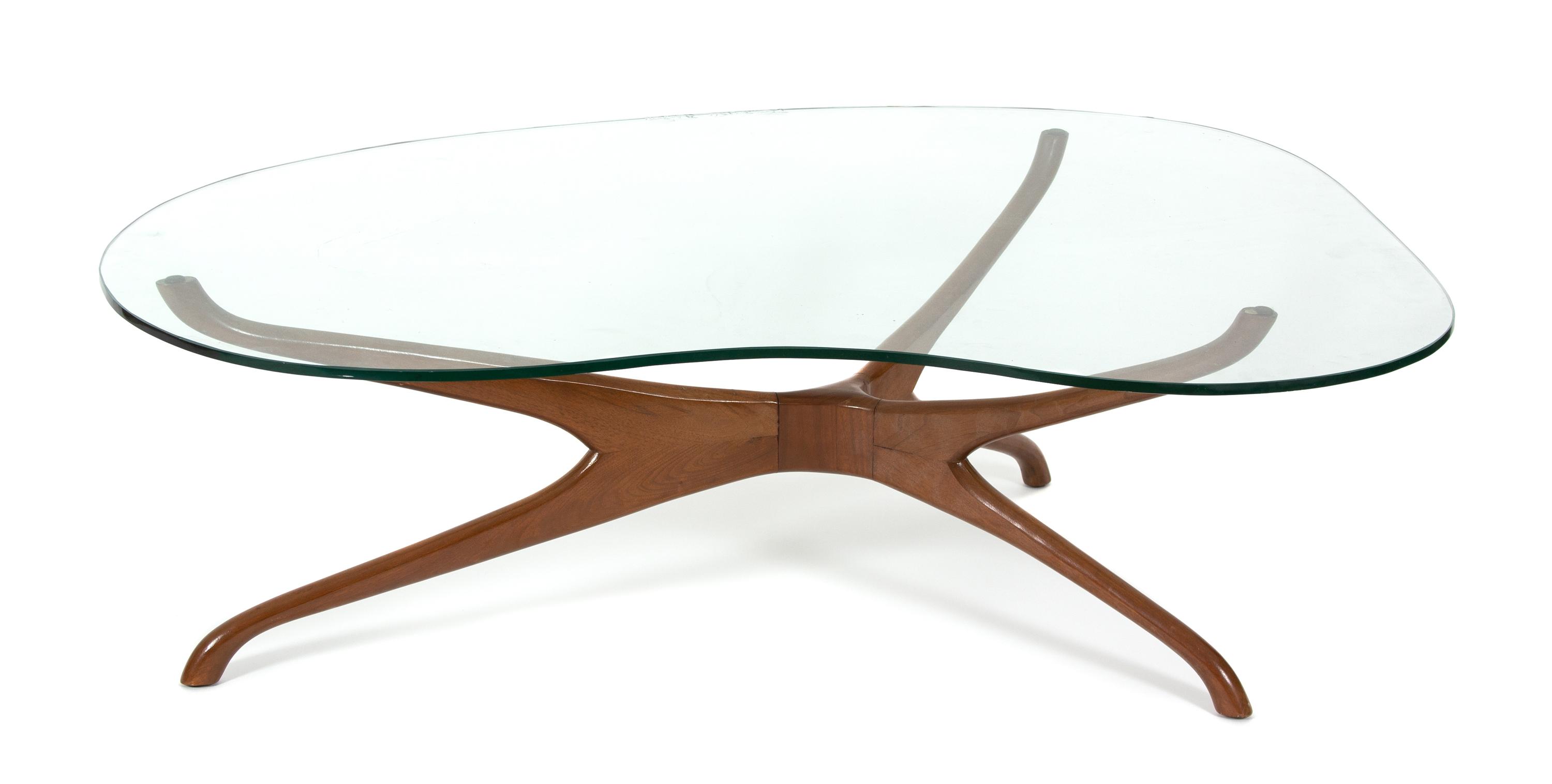 A Trisymmetric Walnut and Glass Coffee Table Height 15 1/2 x width 48 x depth 34 inches. — ATTRIBUTED TO VLADIMIR KAGAN, CIRCA 1950's