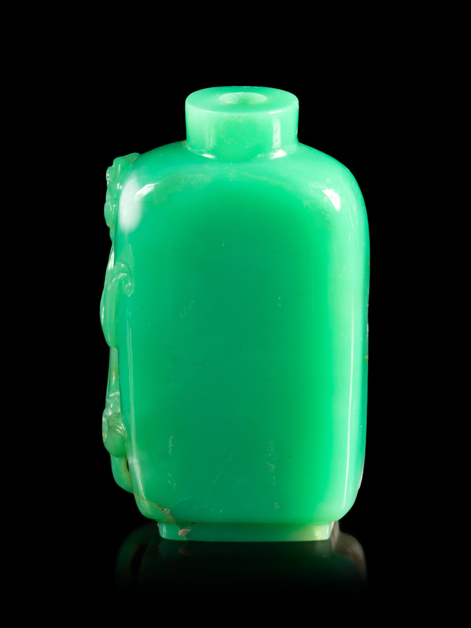 A Chinese Green Glass 'Chilong' Snuff Bottle
