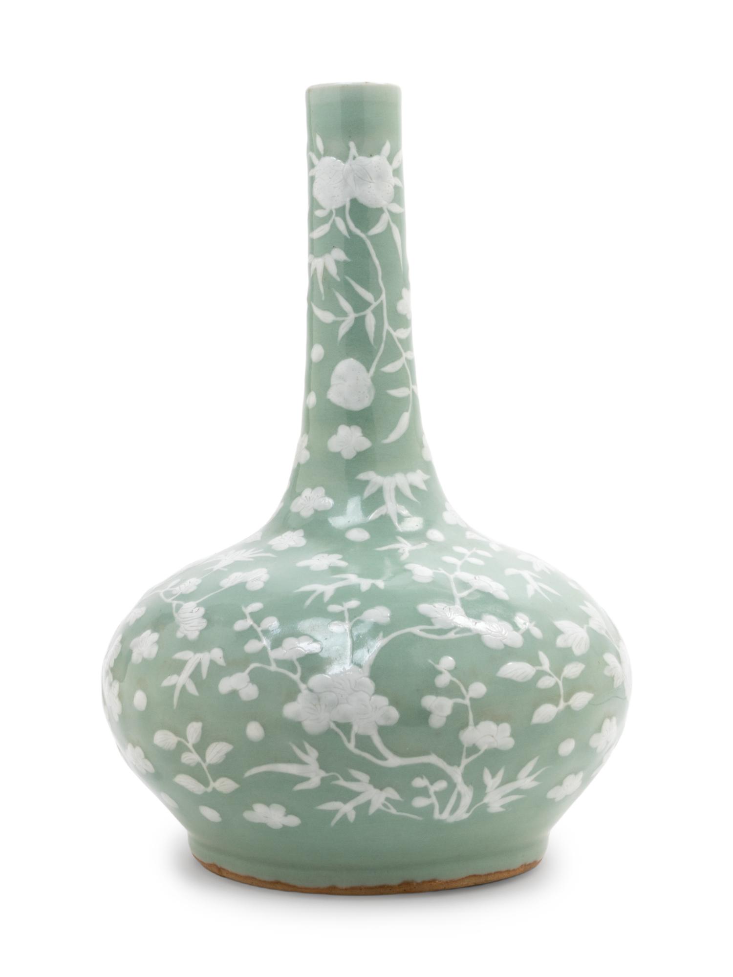 A Celadon Ground White Slip-Decorated Porcelain Bottle Vase