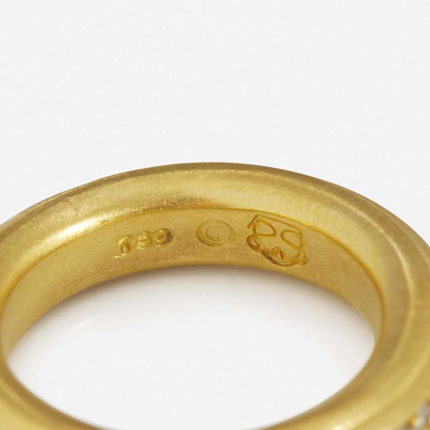 A Set of two 18K Yellow Gold Slane Rings