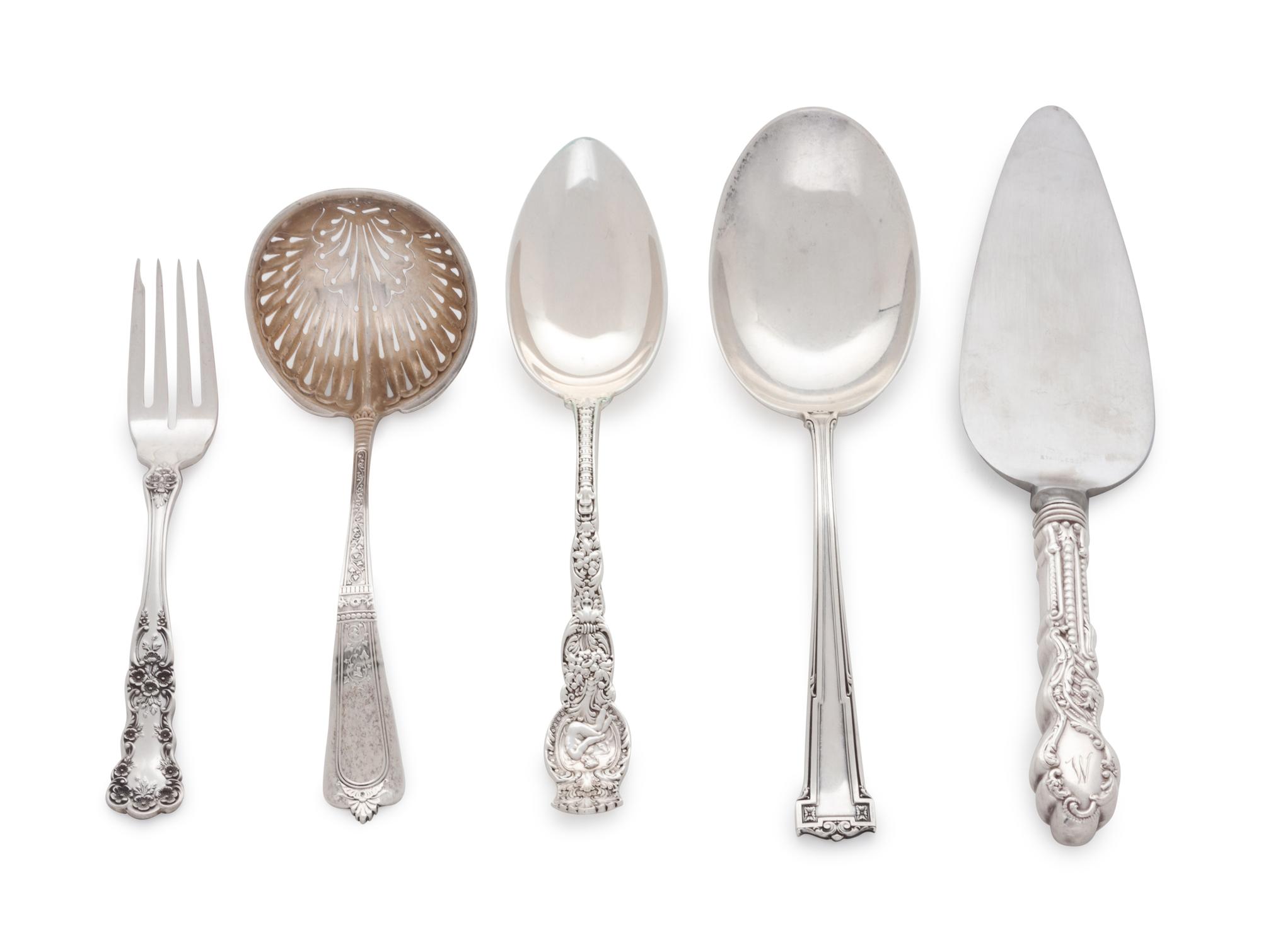 comprising a variety of serving pieces and utensils, 94 items total.