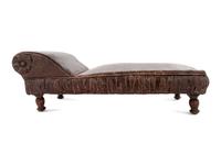A Victorian Diminutive Leather Upholstered Chaise Longue