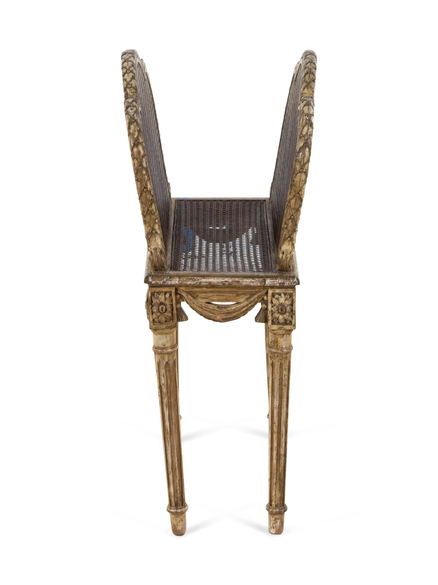 A Louis XVI Style Caned Canterbury