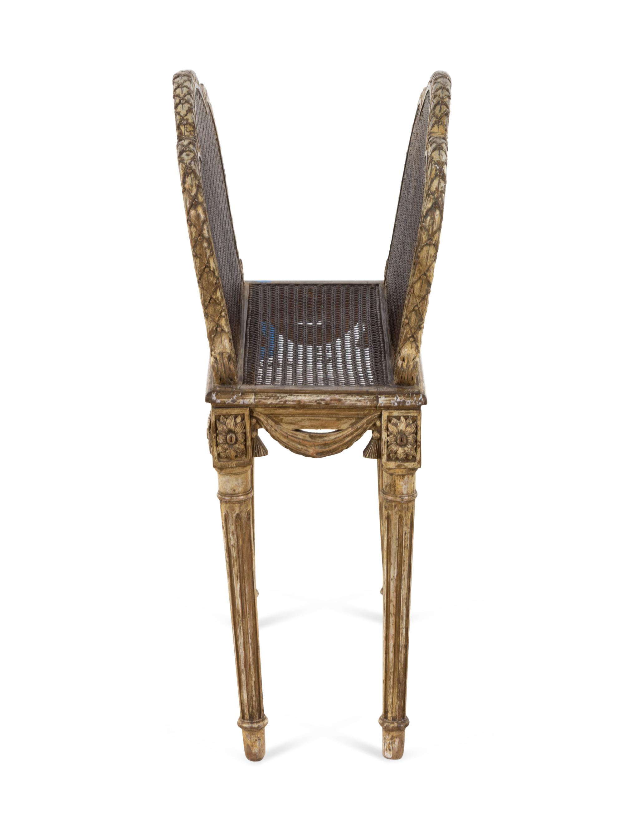 A Louis XVI Style Caned Canterbury