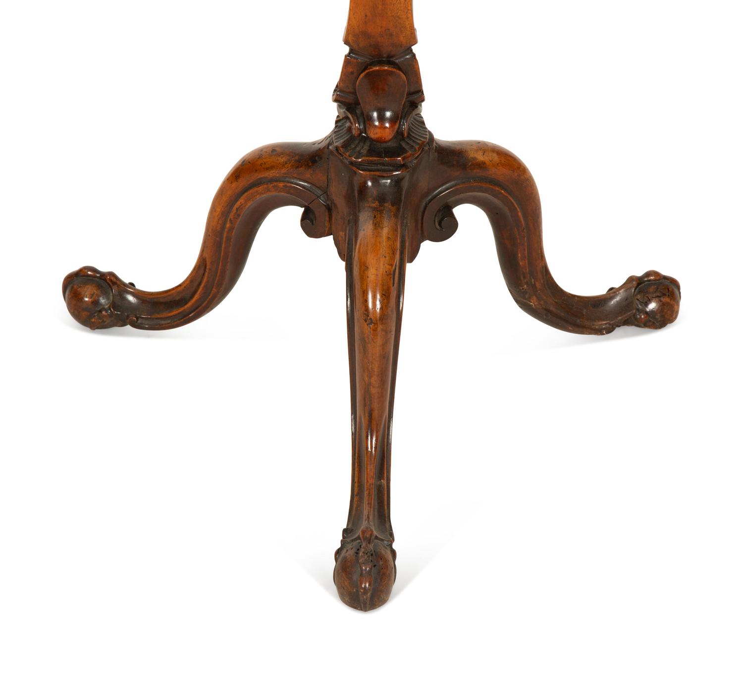 An Italian Rococo Carved Walnut Tripod Stand
