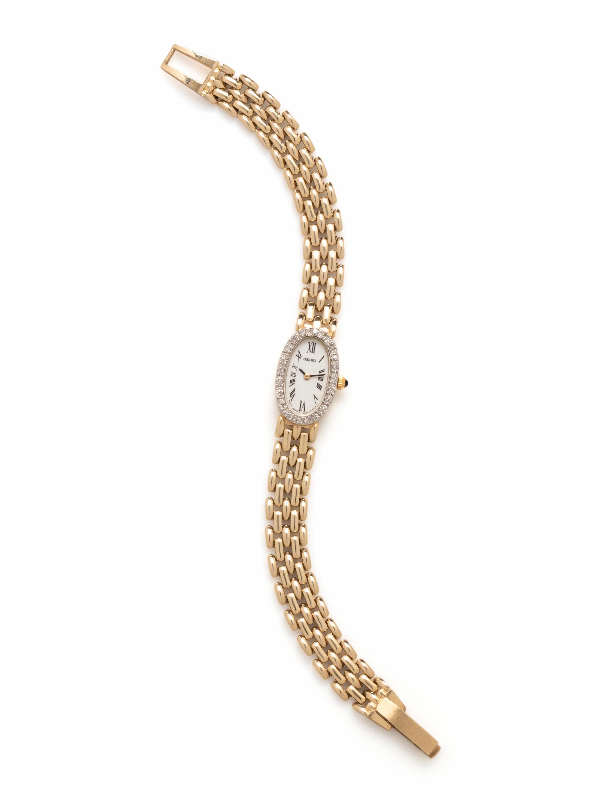 SEIKO, 14K YELLOW GOLD AND DIAMOND WATCH