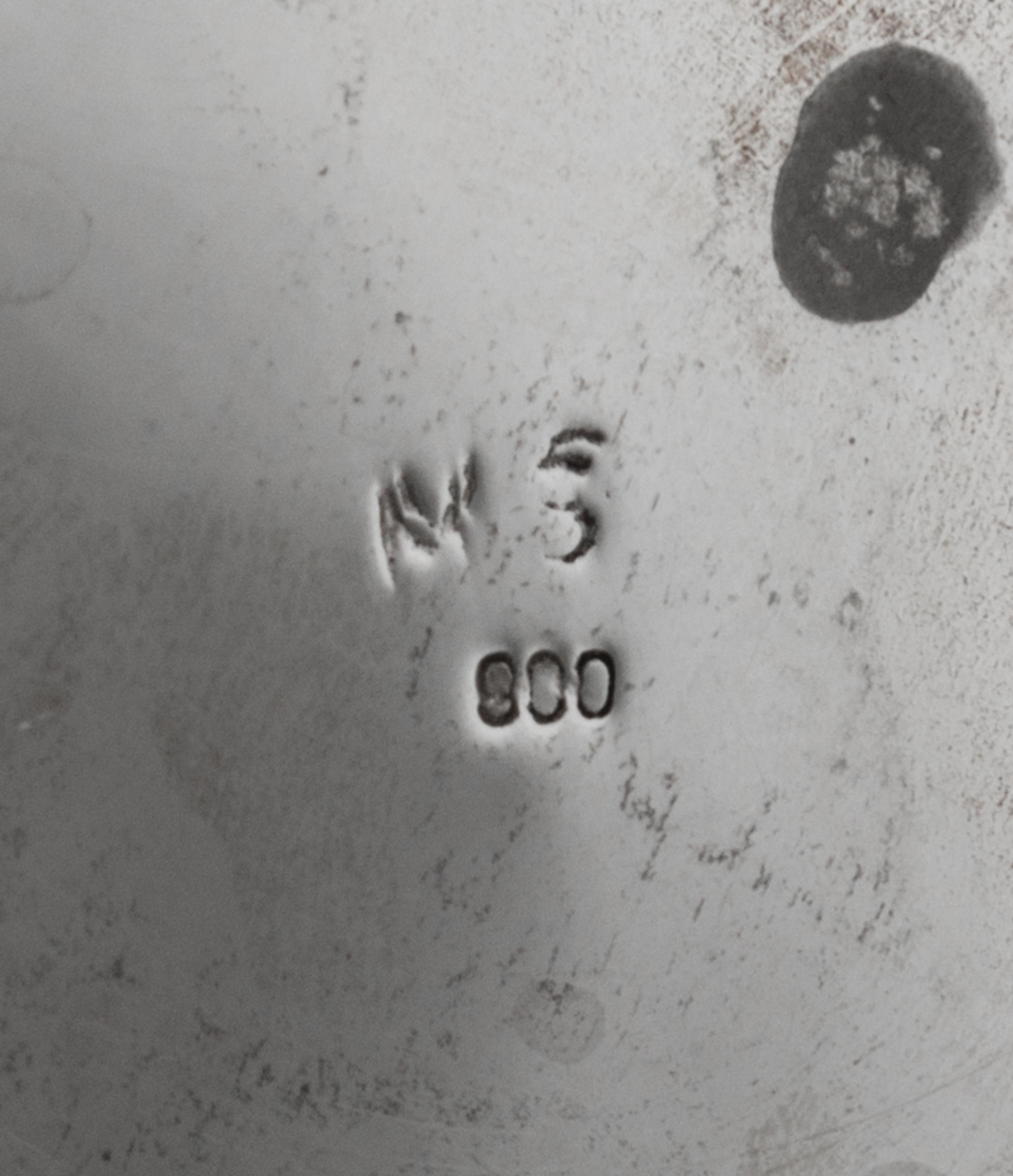A German Silver Center Bowl, Maker's Mark Obscured, Late 19th/Early 20th Century, the body centered with C-scrolls enclosing a vacant c