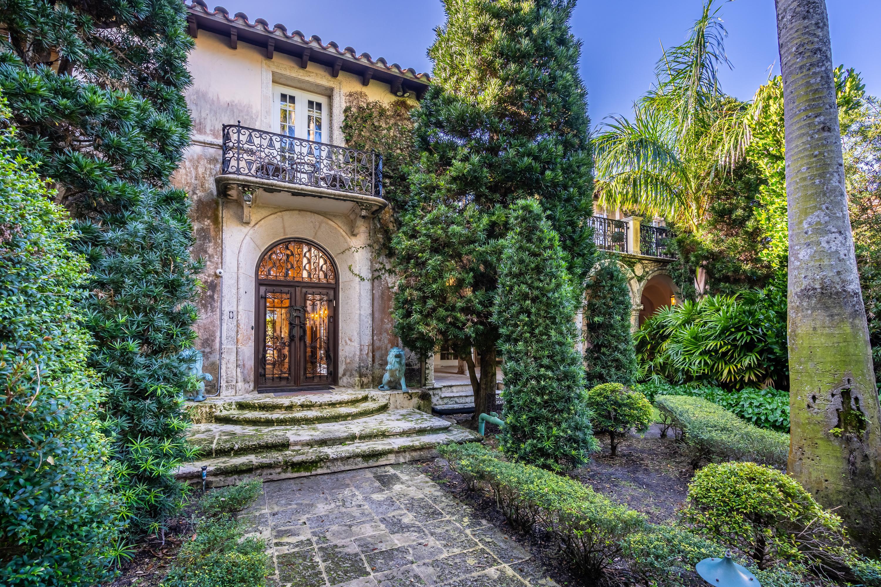 A Copper-Patinated Hammered Metal Fire Screen