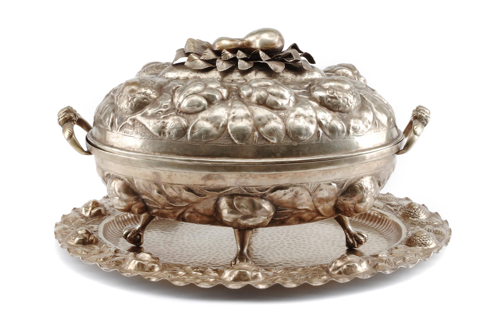 A Portuguese Silver-Plate Tureen on Stand, 20th Century, of oval form with repousse decoration fruit and foliate deocated lid, the ture