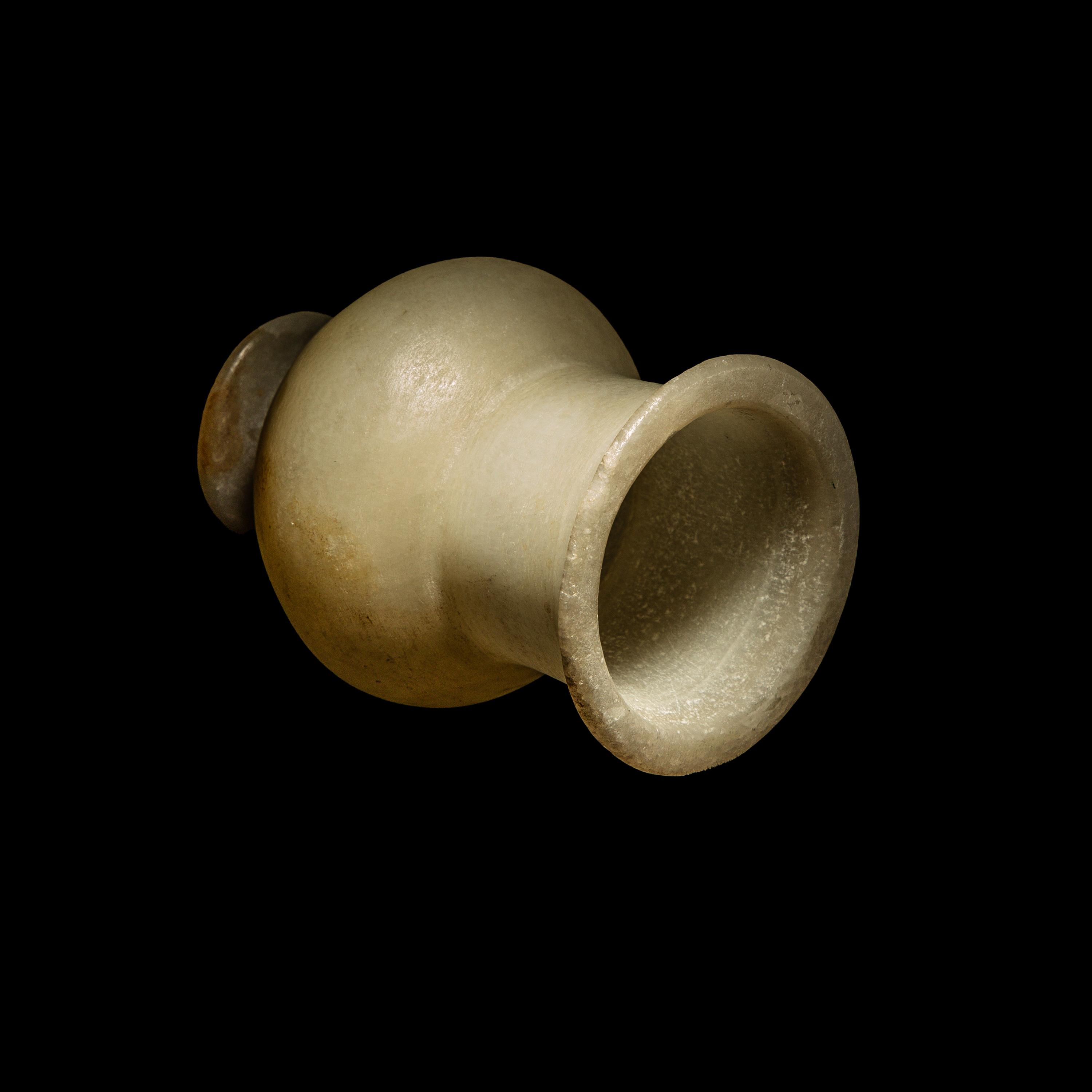 An Egyptian Alabaster Cosmetic Jar