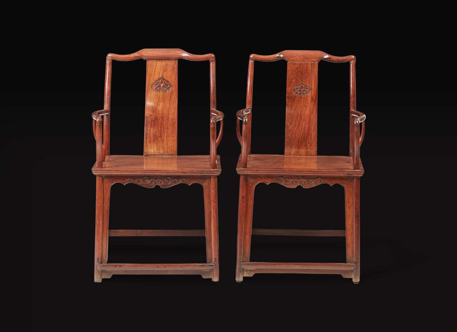 A pair of Chinese huanghuali continuous yoke-back armchairs, Nanguanmaoyi, Qing Dynasty 黃花梨南官帽椅一對 清