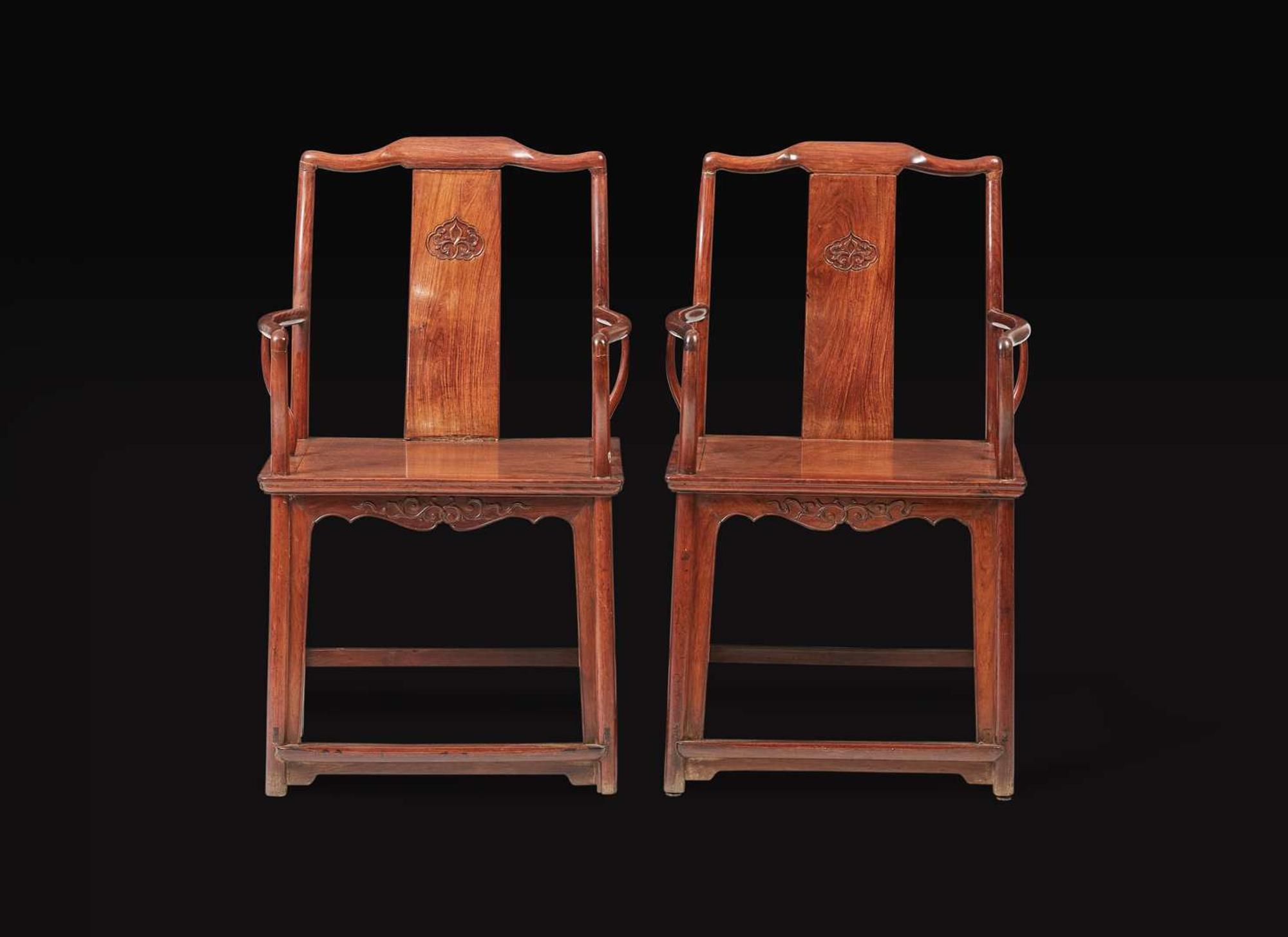 A pair of Chinese huanghuali continuous yoke-back armchairs, Nanguanmaoyi, Qing Dynasty 黃花梨南官帽椅一對 清