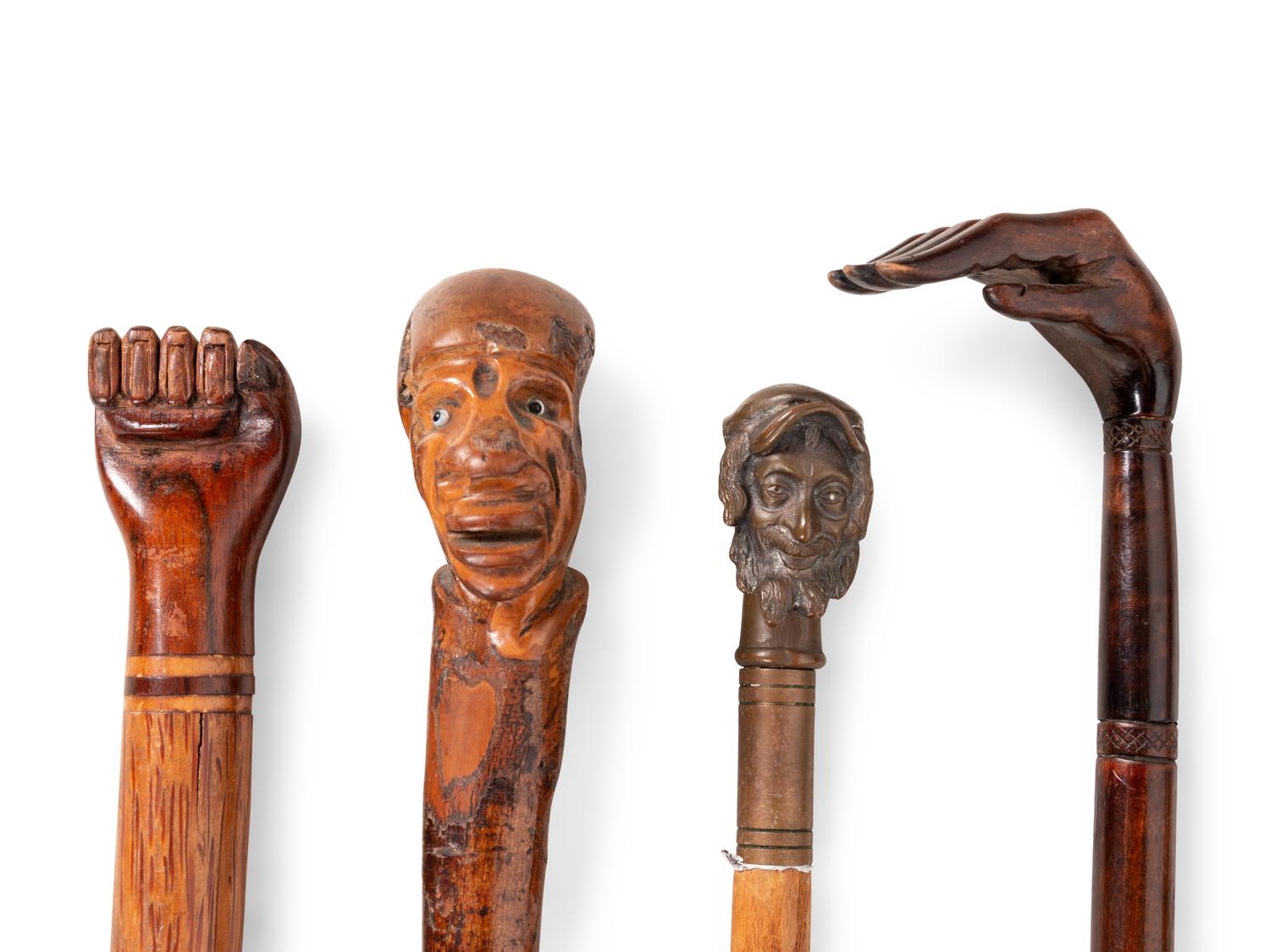 Five Carved and Mixed Metal Figural Canes and Walking Sticks