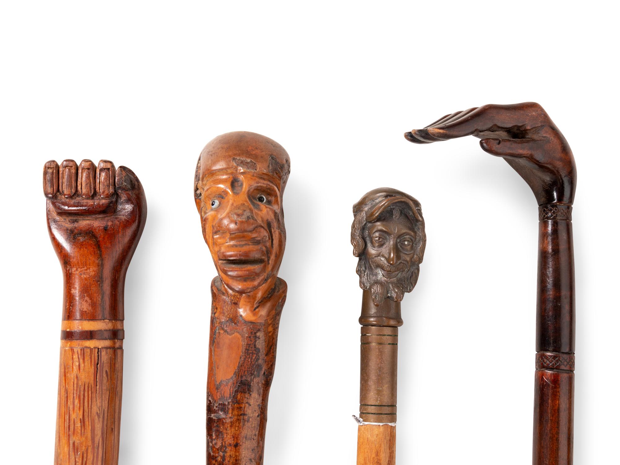 Five Carved and Mixed Metal Figural Canes and Walking Sticks