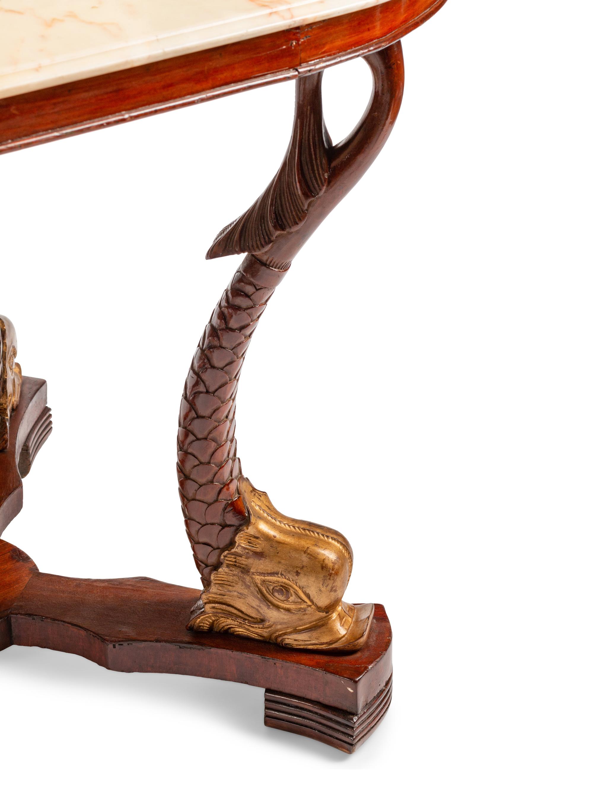 A Northern European Neoclassical Parcel Gilt Mahogany Center Table
