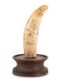 A Scrimshaw Whale's Tooth