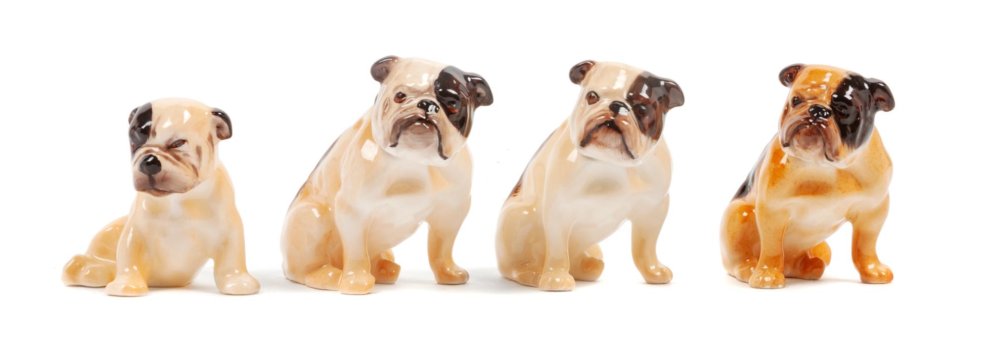 A Group of Four Royal Doulton Bulldogs Height of tallest 2 1/4 inches.