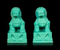 A Pair of Chinese Molded Glass Figures of Fu Lions
