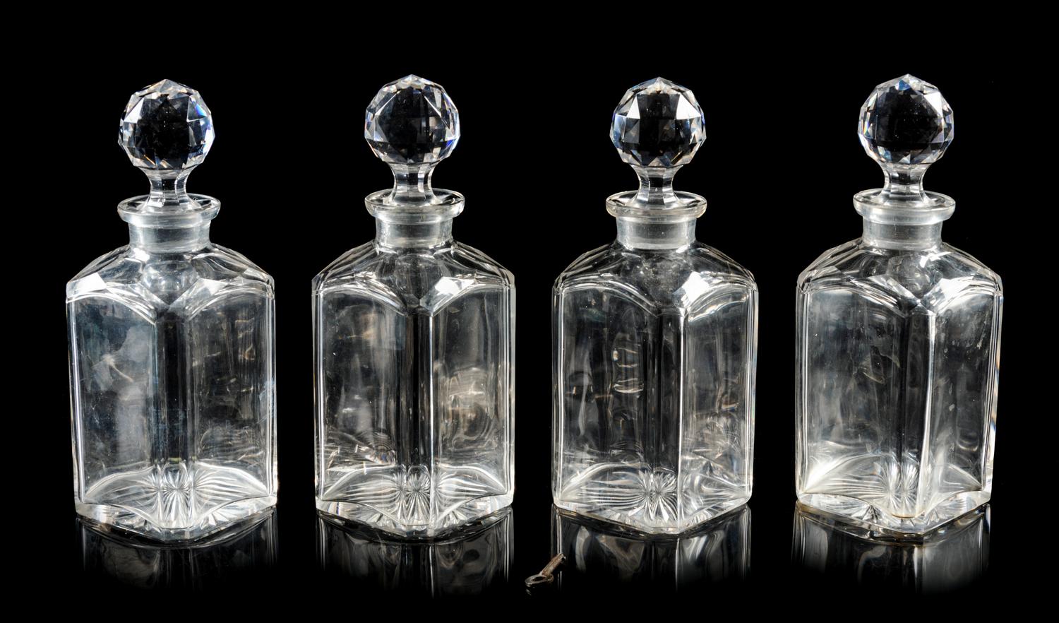 An English Oak Cased Cut Glass Decanter Set