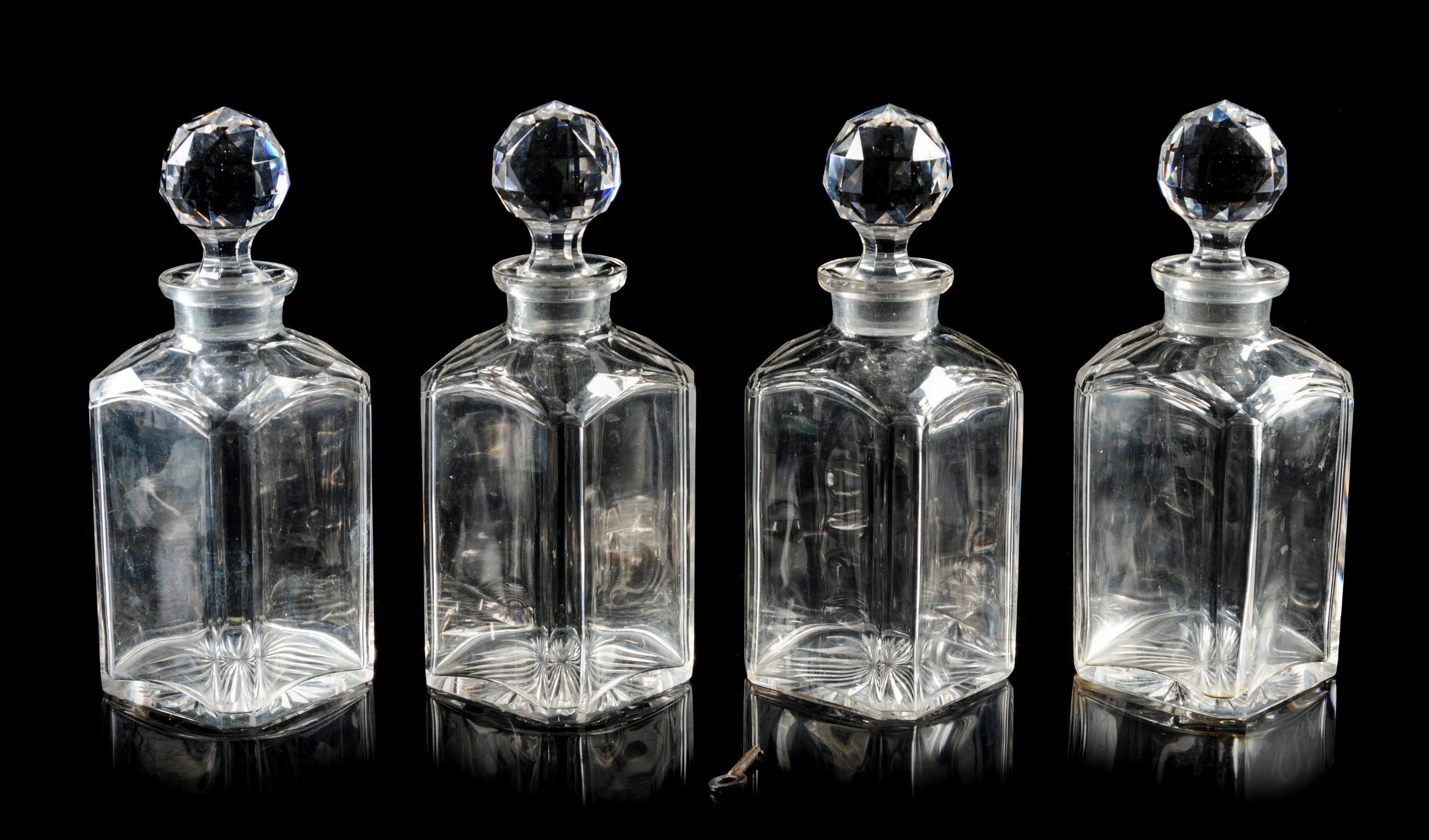 An English Oak Cased Cut Glass Decanter Set