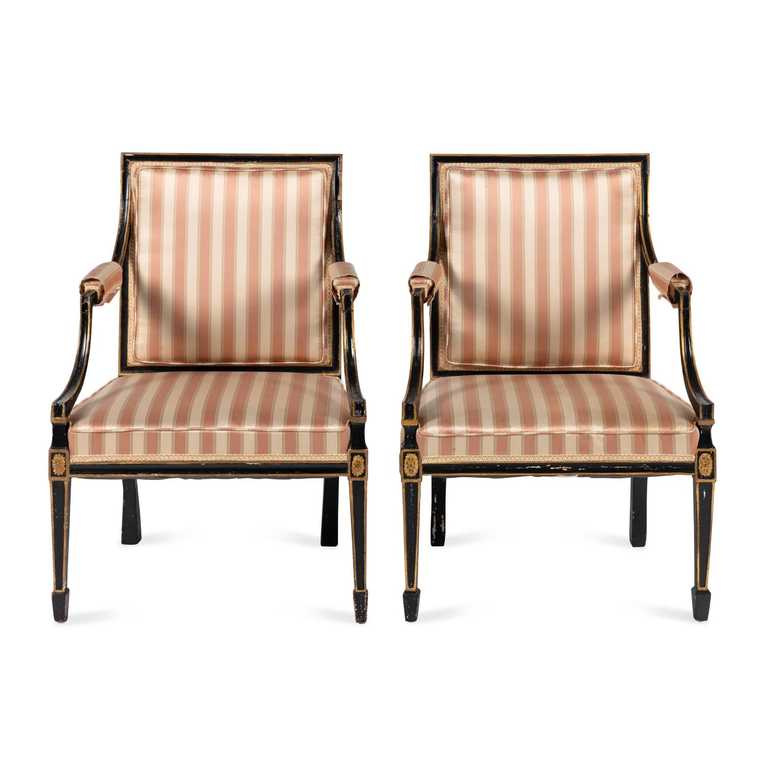 A Pair of Regency Style Ebonized and Parcel-Gilt Armchairs
