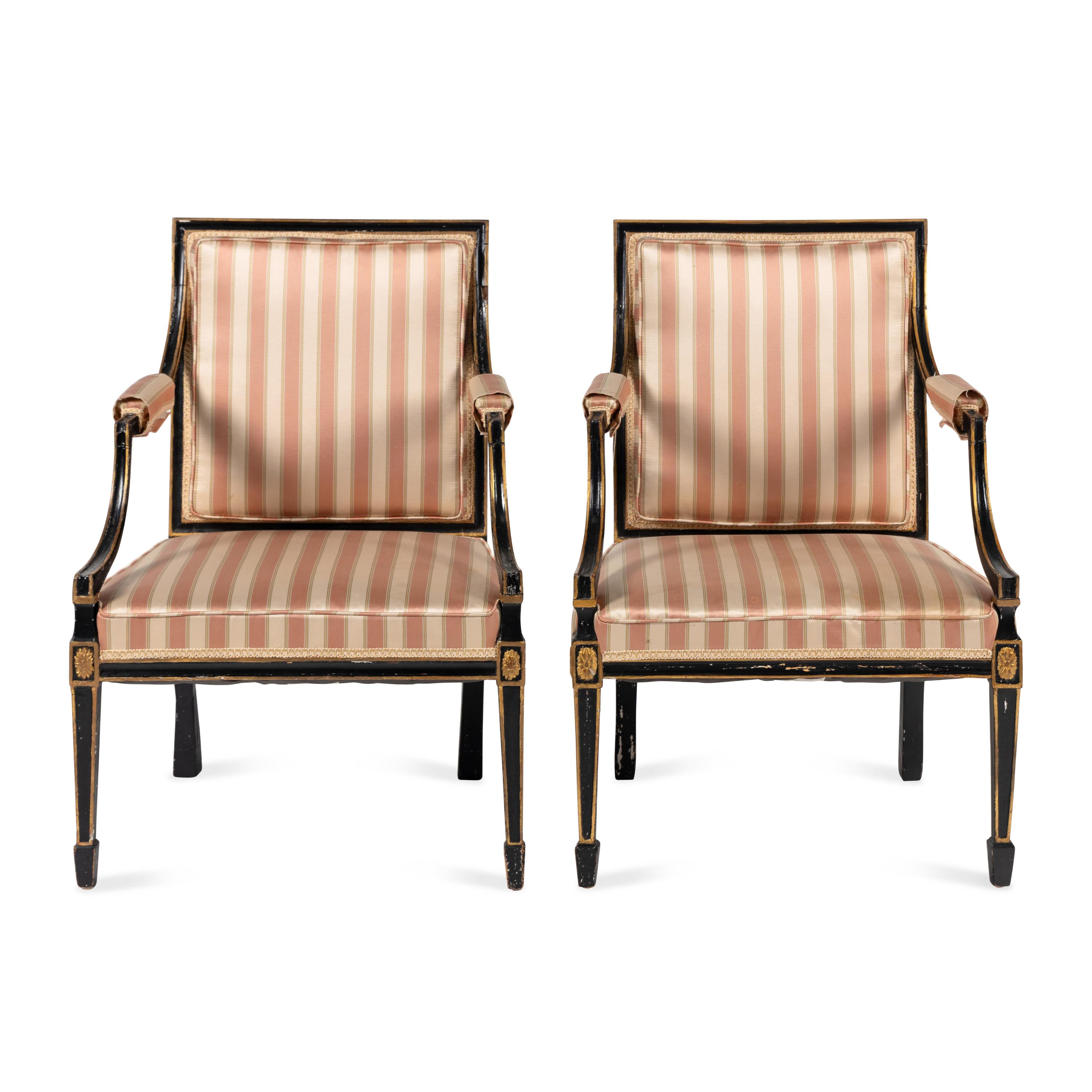 A Pair of Regency Style Ebonized and Parcel-Gilt Armchairs