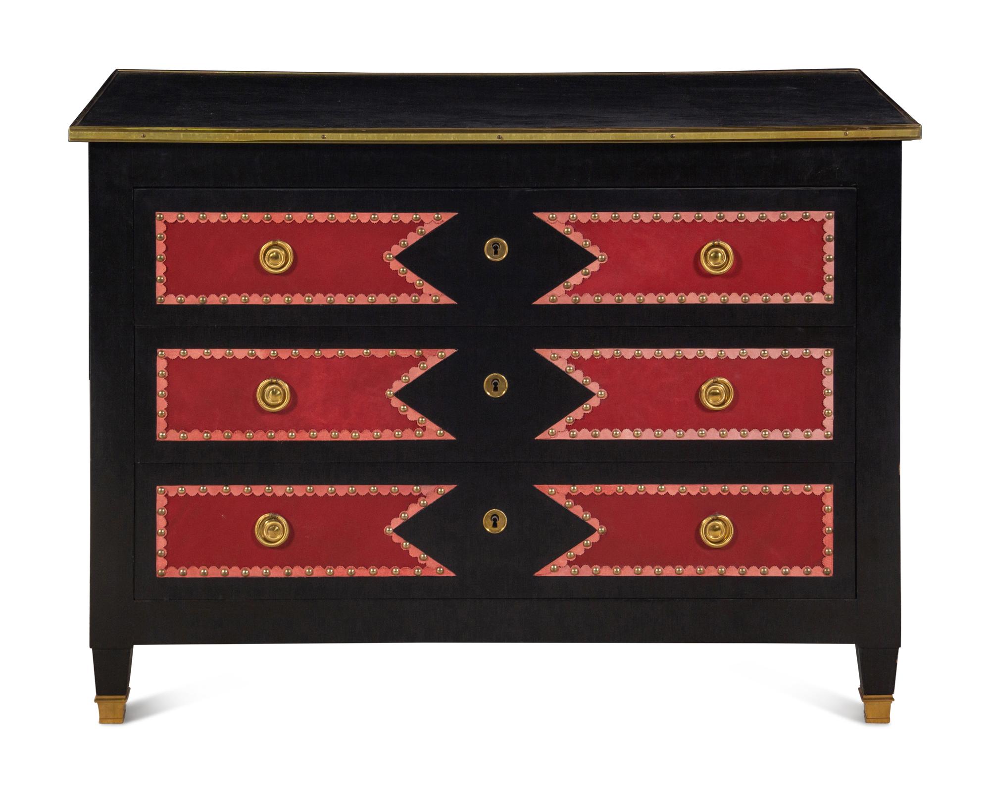 A Black Painted Red Leather-Inset Chest of Drawers