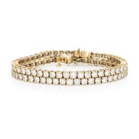 Pair of Yellow Gold and Diamond Line Bracelets