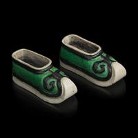 A Pair of Chinese Famille Verte Glazed Biscuit Porcelain "Shoes", 18th Century 清中期 素三彩雕瓷鞋模型一對
