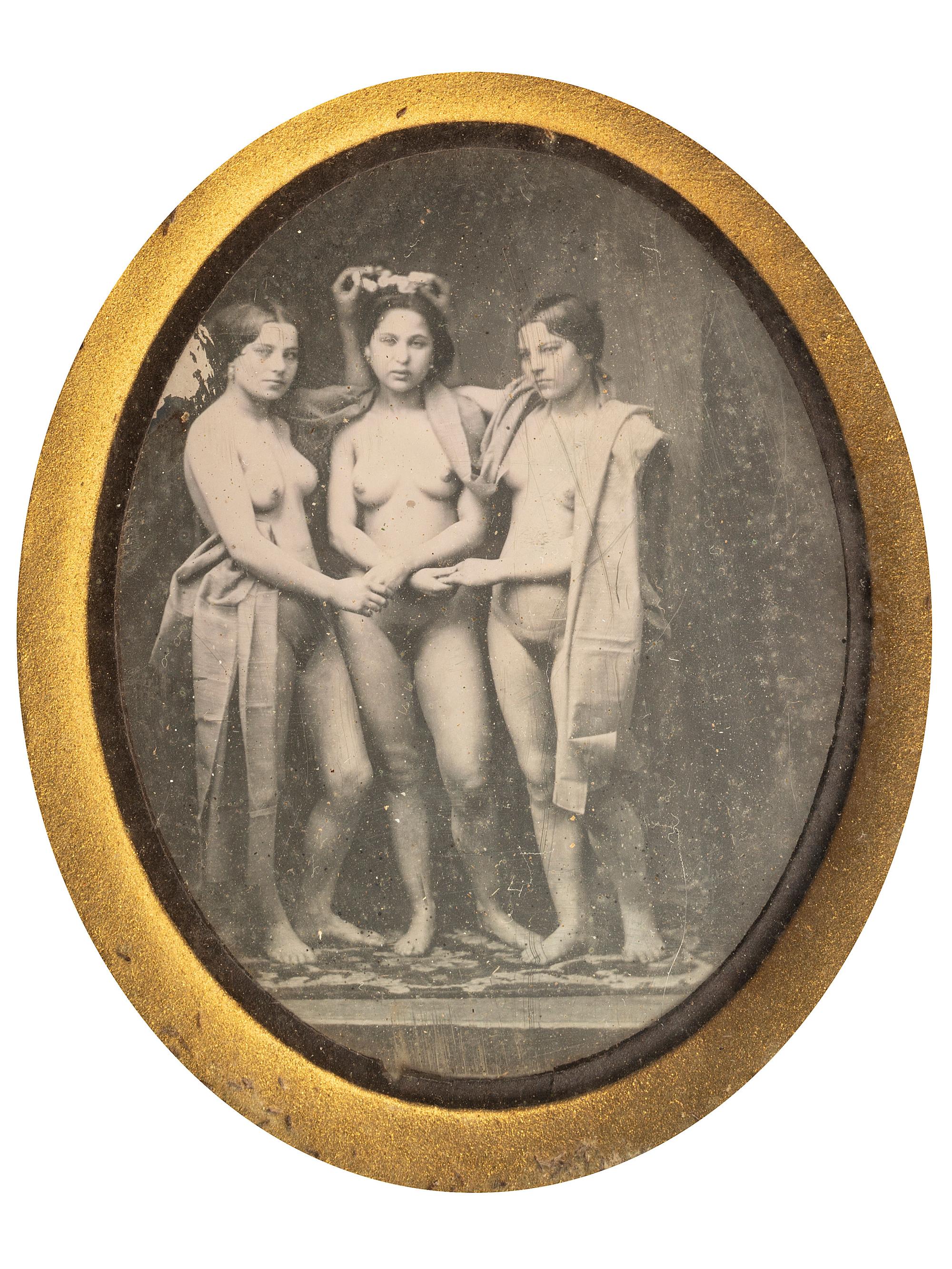 [EARLY PHOTOGRAPHY]. Daguerreotype of a trio of nude women.
