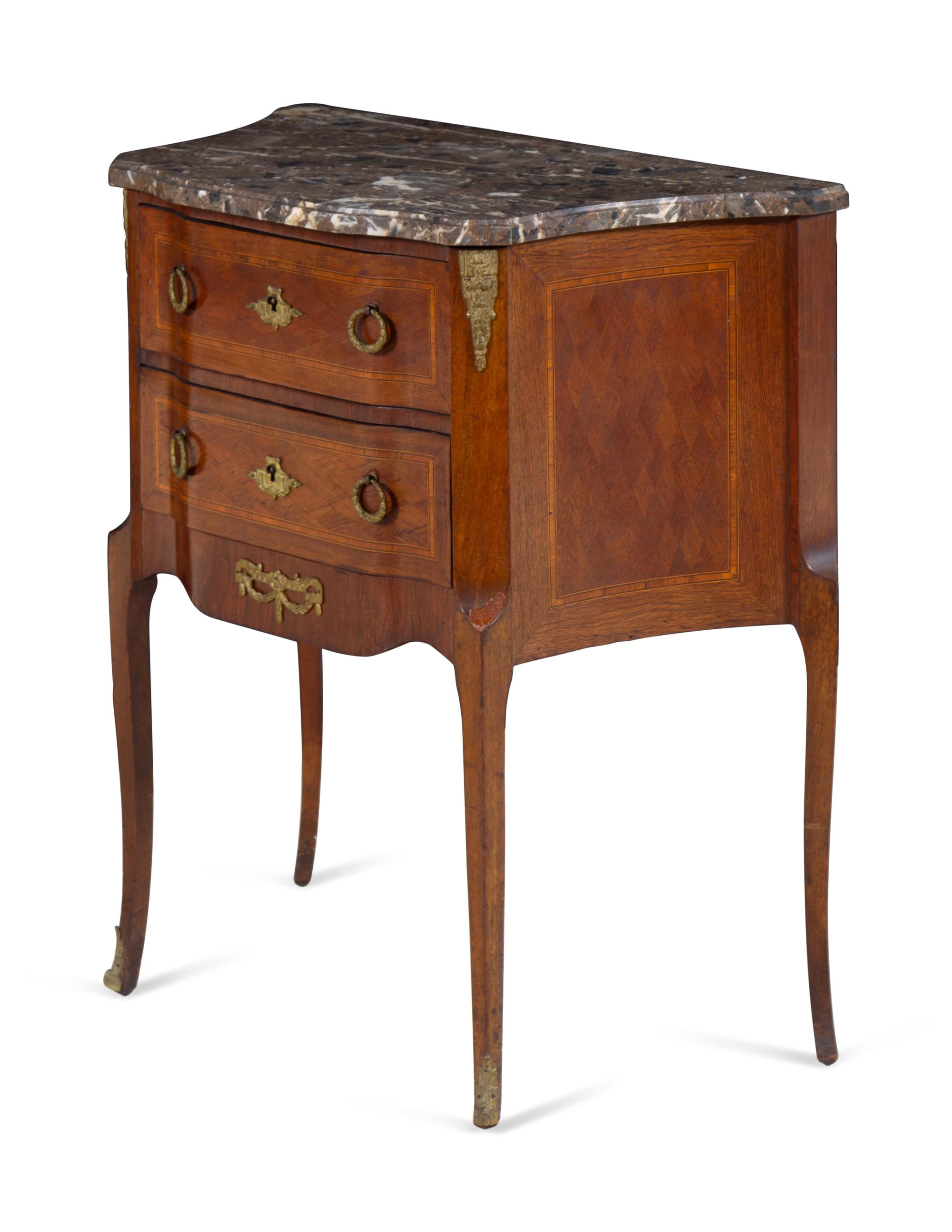A Louis XV/XVI Transitional Style Gilt Metal Mounted Marble-Top Commode