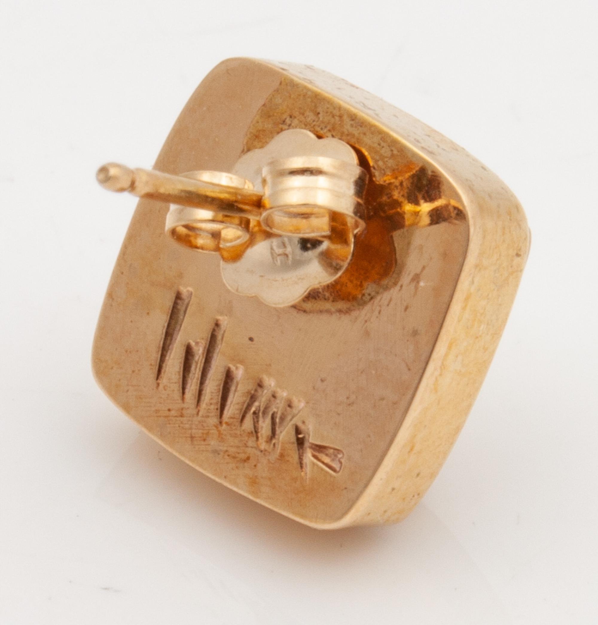 Gold And Fossilized Walrus Earrings Lot is located and will ship from Denver, Colorado.