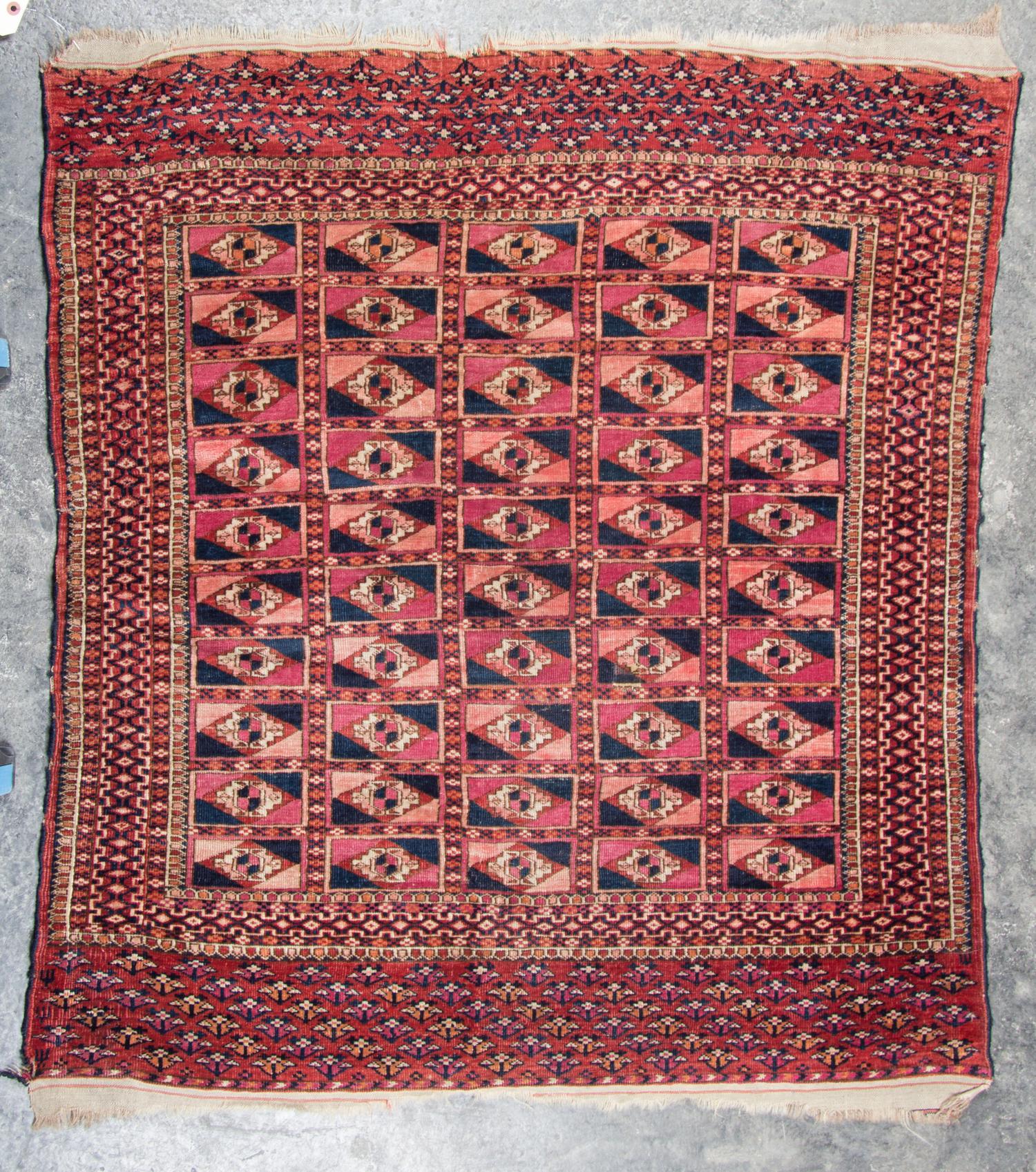 A Group of Three Rugs Largest 5 feet 10 inches x 3 feet 4 inches.