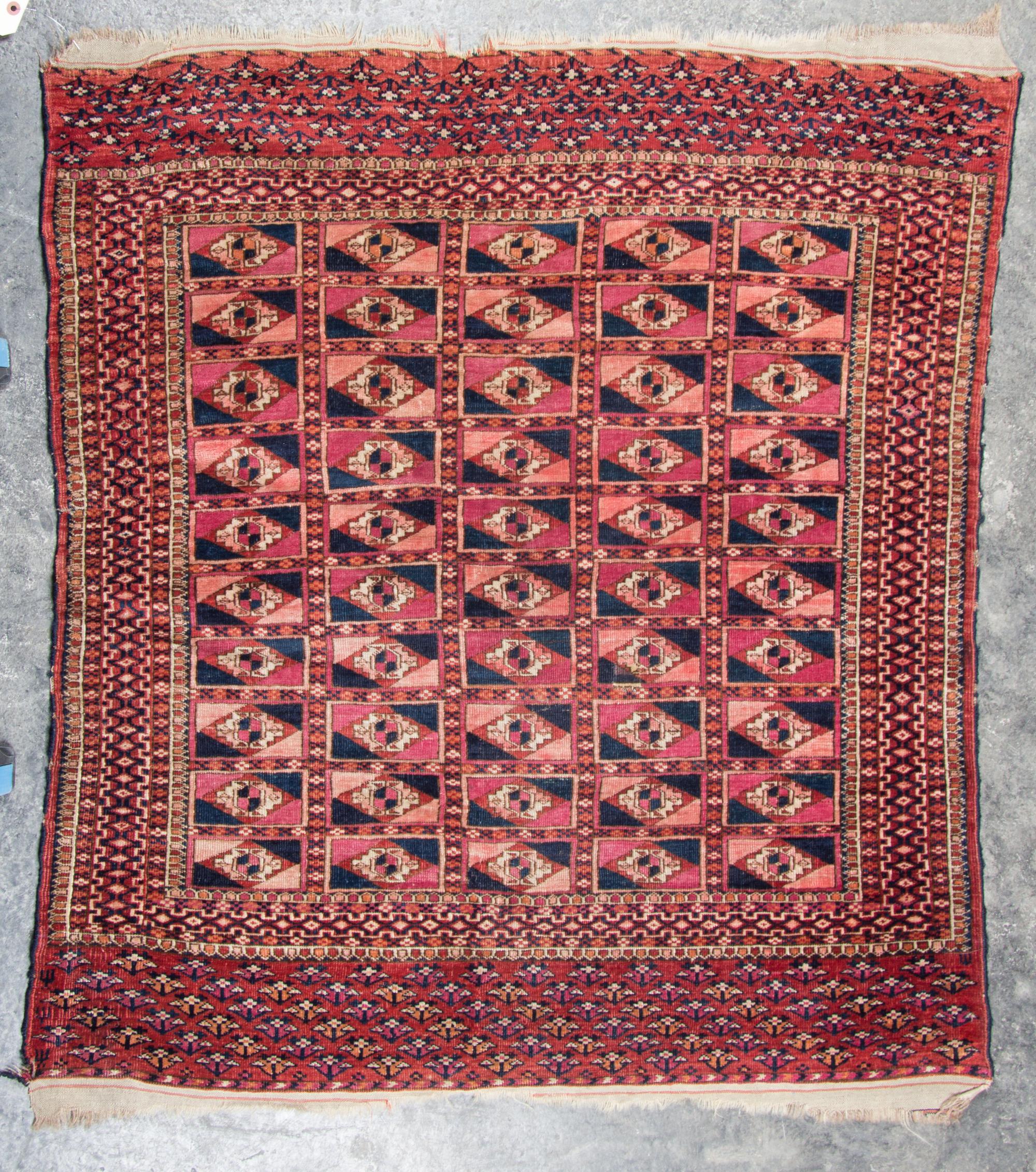 A Group of Three Rugs Largest 5 feet 10 inches x 3 feet 4 inches.