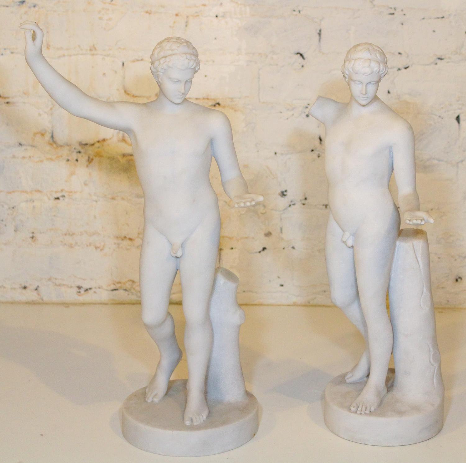 A Pair of Carved Alabaster Figures. Height of first 19 1/4 inches.