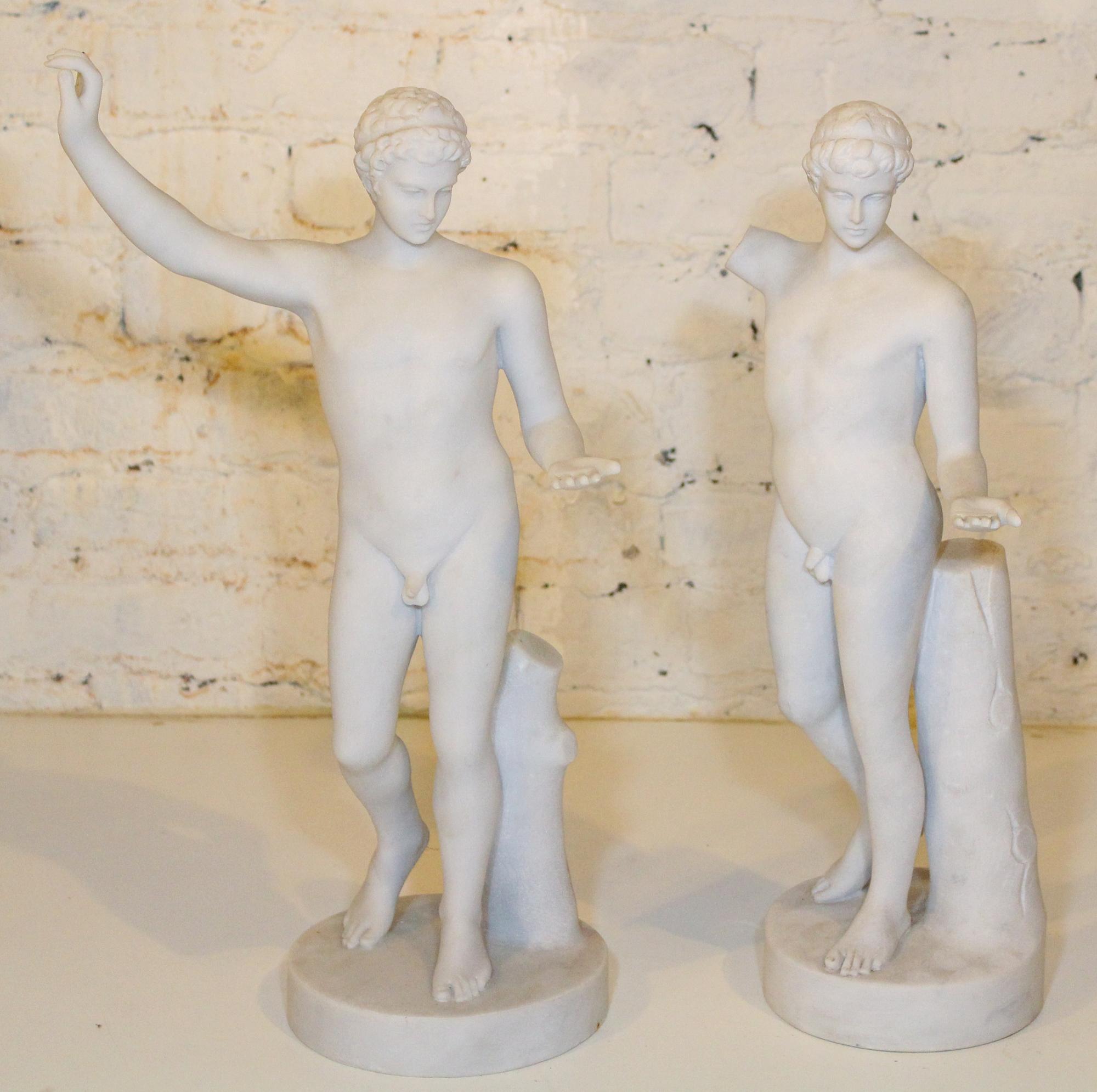 A Pair of Carved Alabaster Figures. Height of first 19 1/4 inches.