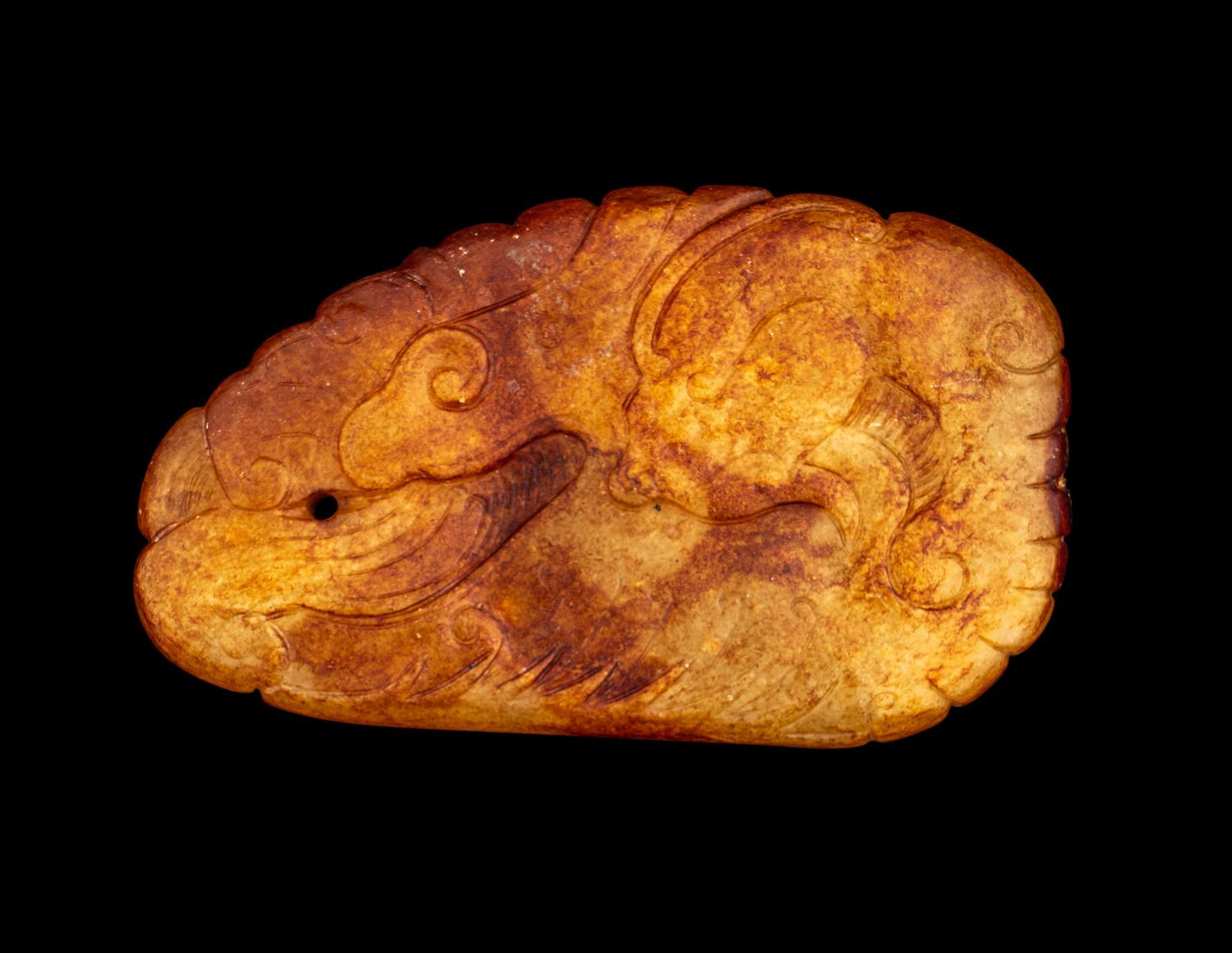 A Chinese Russet and White Jade 'Dragon' Pendant