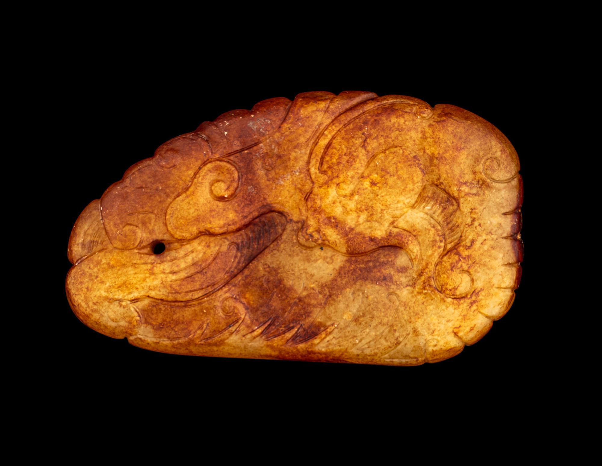 A Chinese Russet and White Jade 'Dragon' Pendant