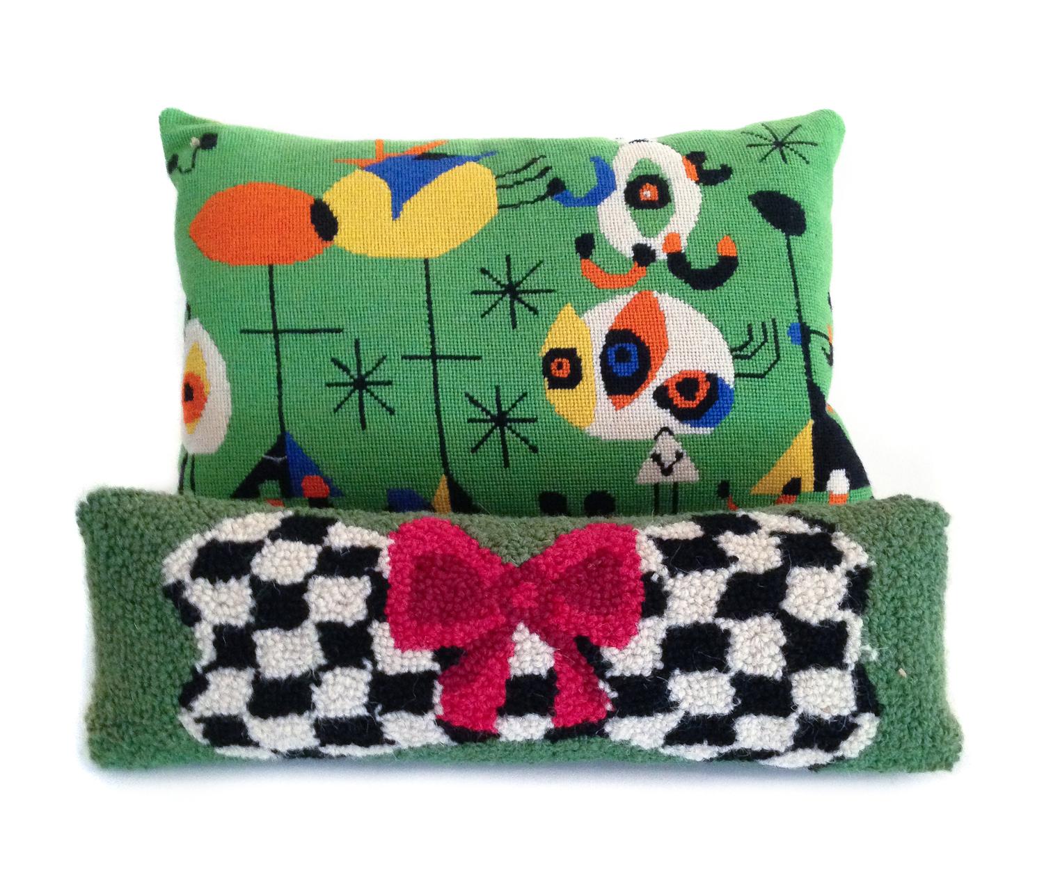 Two Needlepoint Pillows Length of largest 17 1/4 inches.