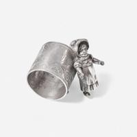 A collection of thirty-four Victorian silverplated and pewter napkin holders Various American and Canadian makers, Connecticut, Massachusetts, and Ontario, late 19th century