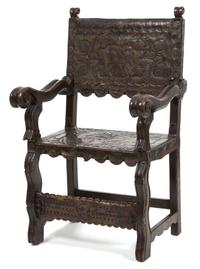 An Italian Baroque Carved Walnut & Leather Armchair Height 40 1/2 x width 24 x depth 20 inches. — 17TH/18TH CENTURY
