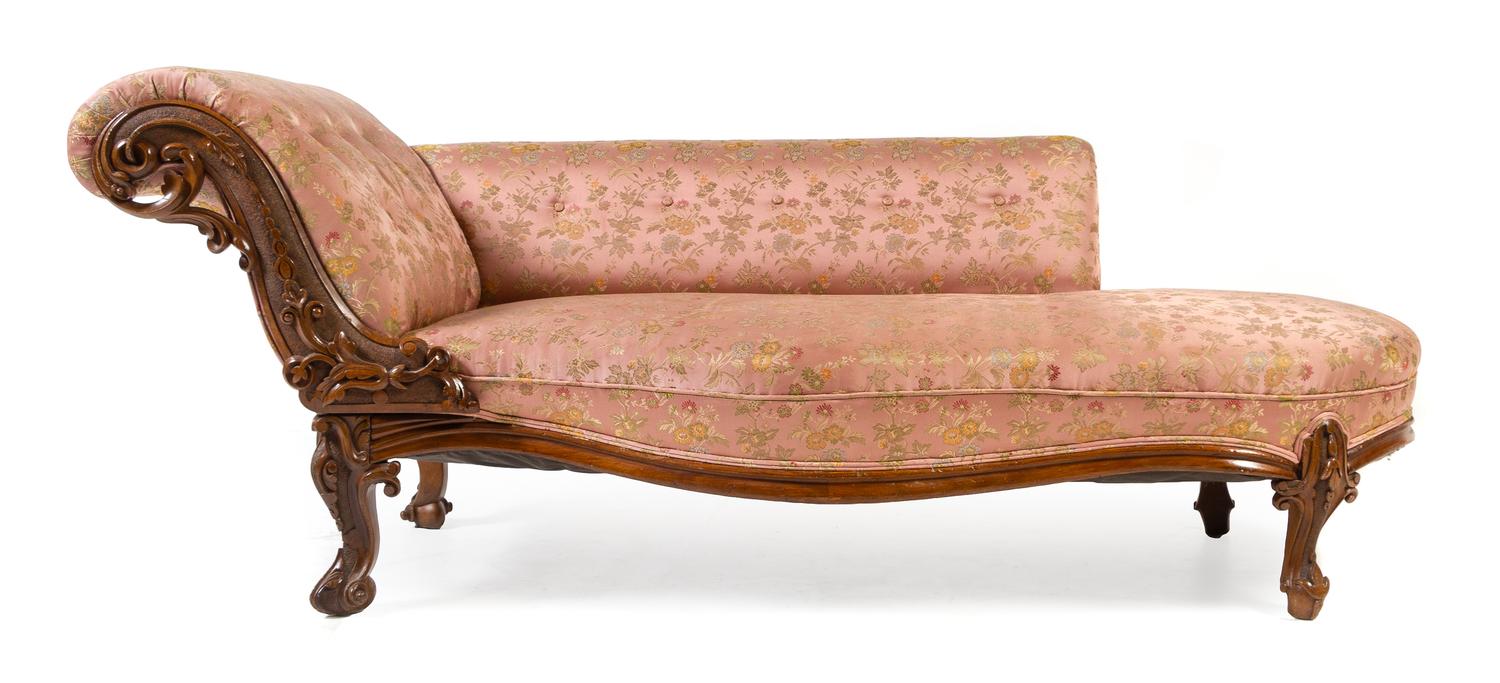 A Victorian Carved Walnut Chaise Width 72 inches. — 19TH CENTURY