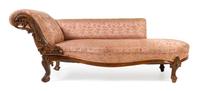 A Victorian Carved Walnut Chaise Width 72 inches. — 19TH CENTURY